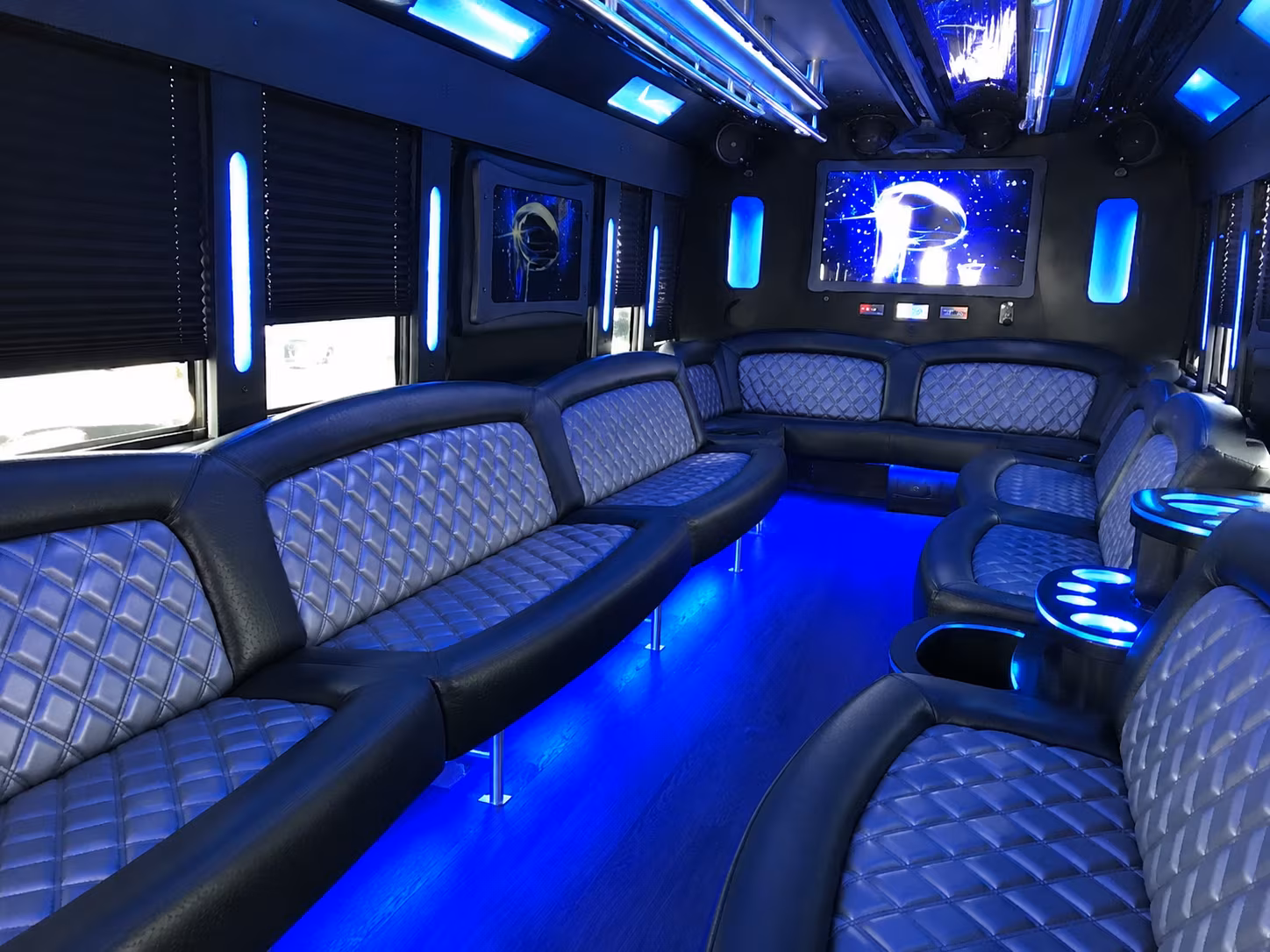 Wedding guests seated inside a party bus serving Dearborn